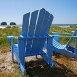 Adirondack chairs a;ong the beach, Rockaway Beach, Oregon
