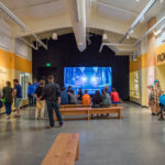 Viewing windows and video screen inside Tillamook Creamery.